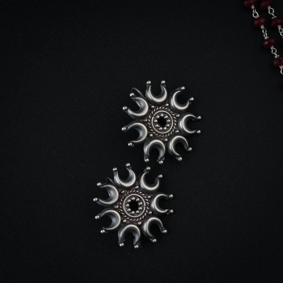 Silver Chandrakor Motif Set with Garnets