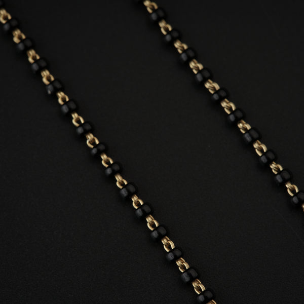 Black and gold beaded Saraswati Mangalsutra for jewelry