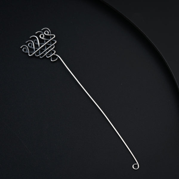 Silver bookmark and coin with intricate design for home and garden decor