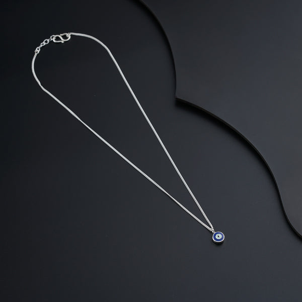 a necklace with a blue evil eye on it