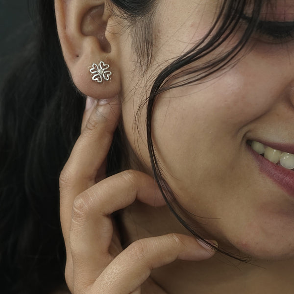 Woman wearing Silver Love Flower Earring