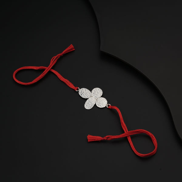 Silver Hammered Flower Rakhi