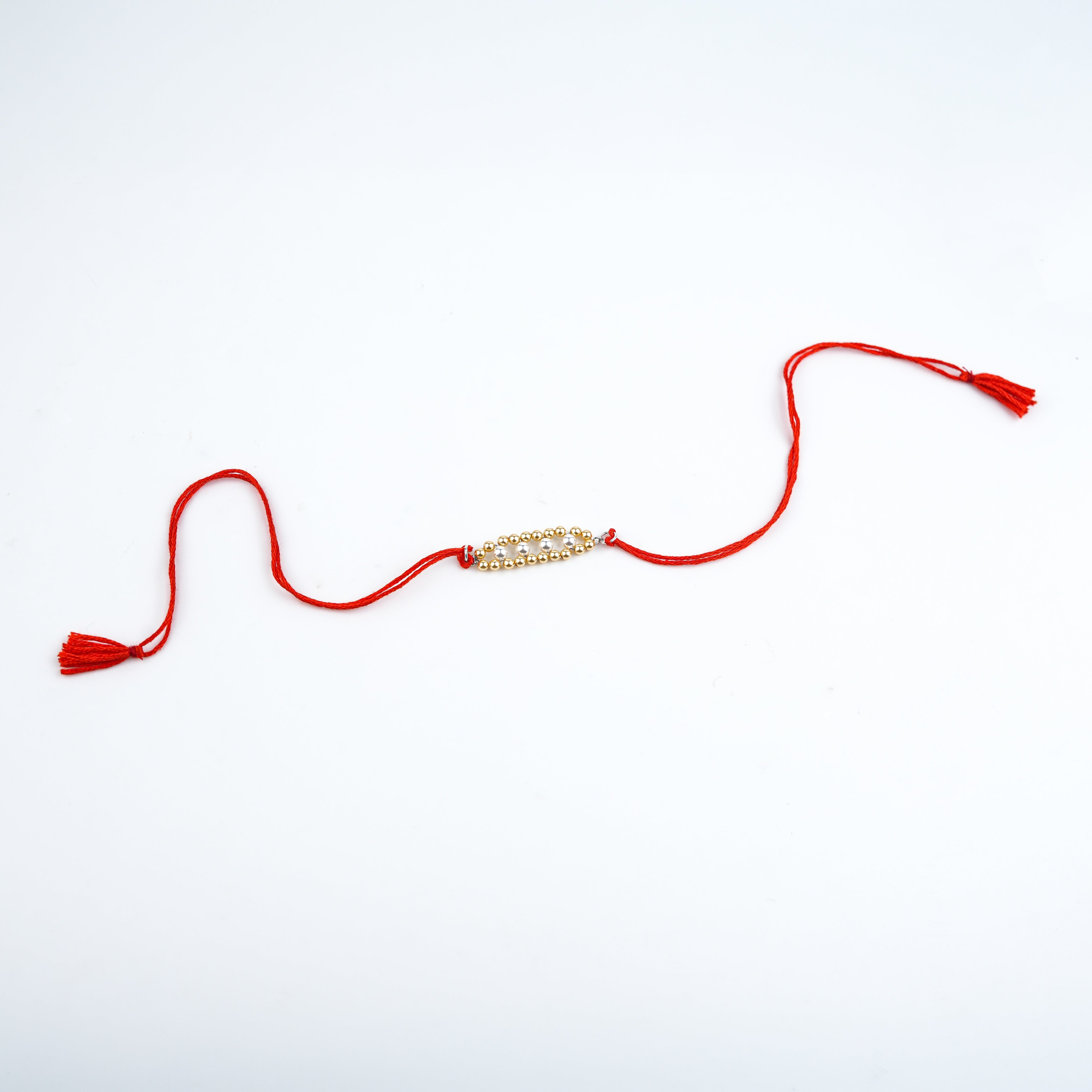Golden & White Pearl Handmade Silver Rakhi