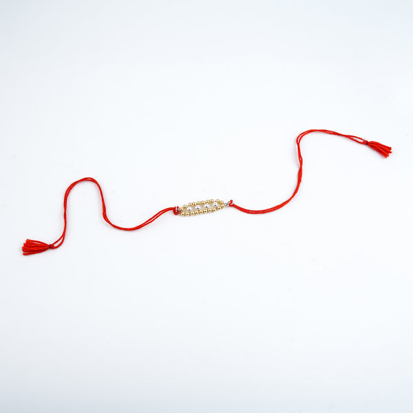 Golden & White Pearl Handmade Silver Rakhi