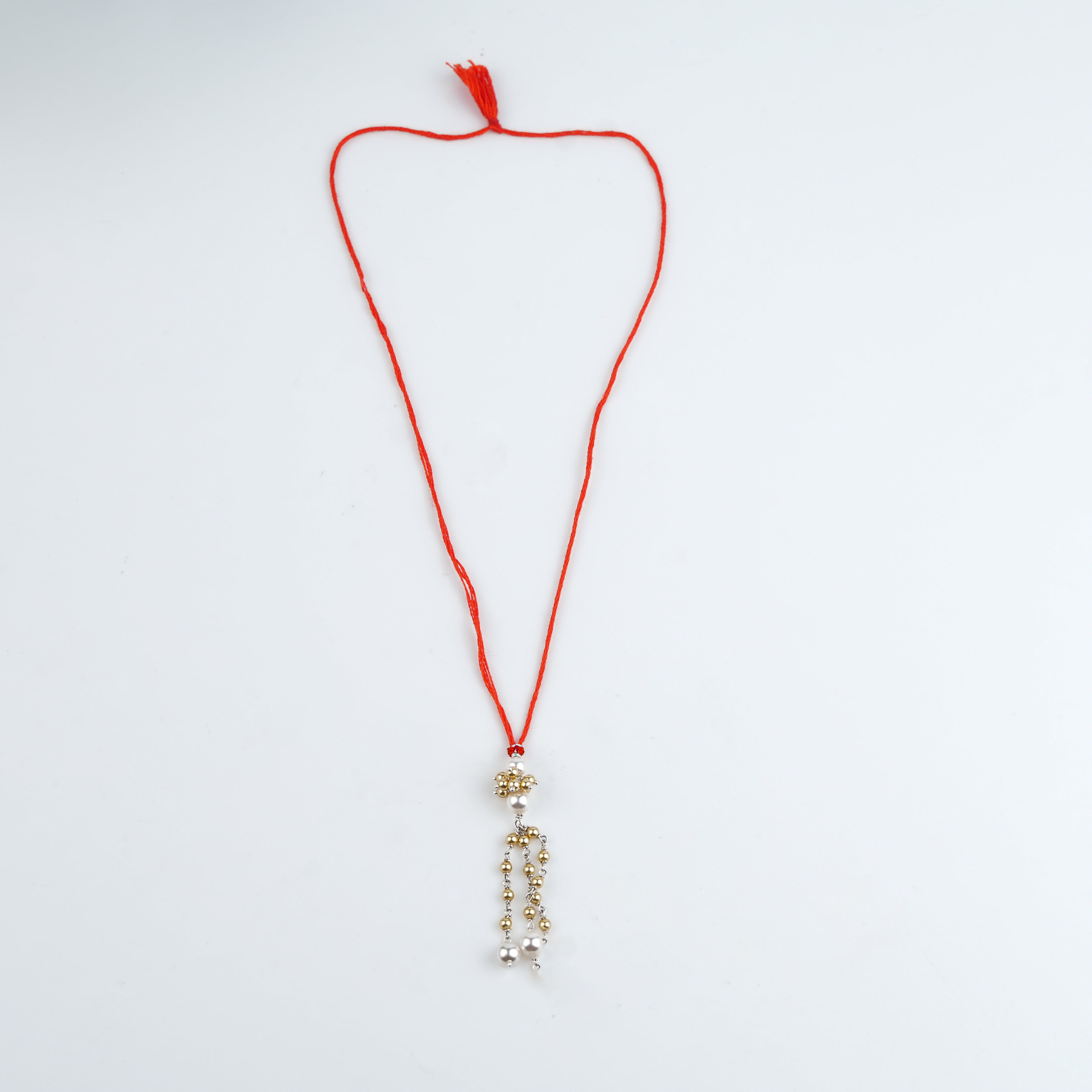 Golden & White Pearl Handmade Silver Lumba Rakhi