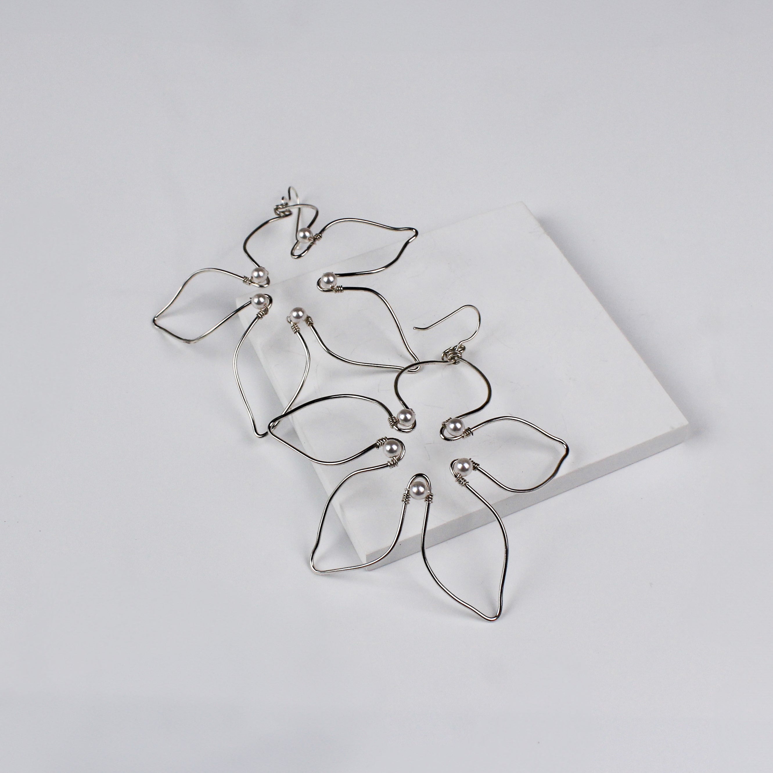 Handbent Pearl Silver Flower Earrings
