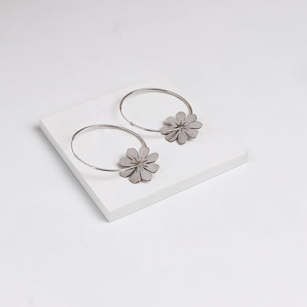 Silver flower hoop earrings