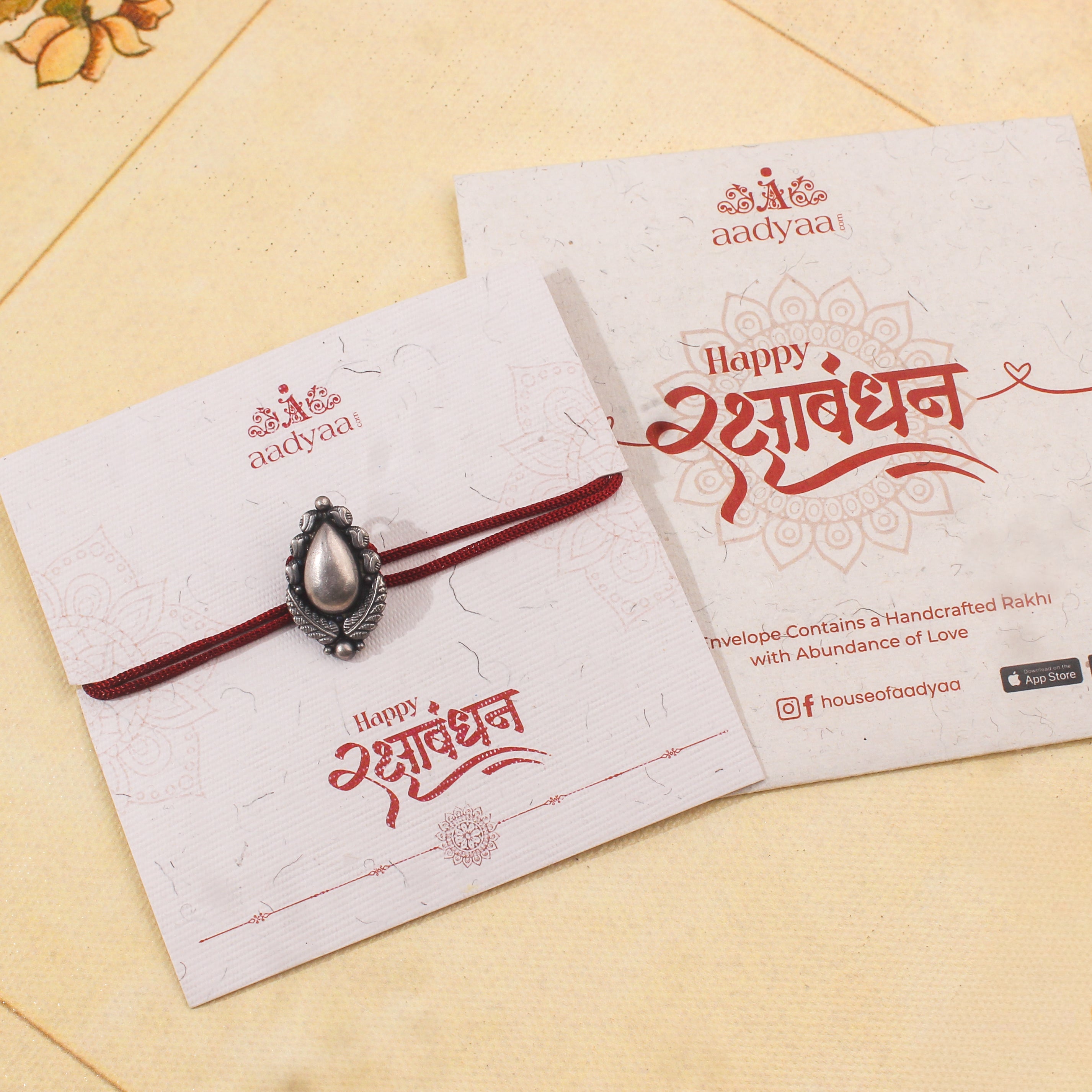 Handcrafted Silver Rakhi/Pendant: Drop