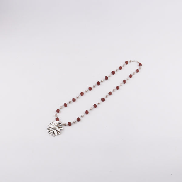 Model wearing Silver Soorajmukhi Pendant Pink Strawberry Cubes