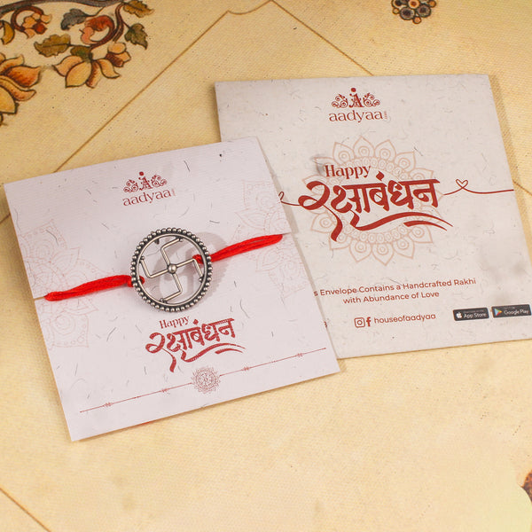 Handcrafted Silver Rakhi/Pendant: Swastik
