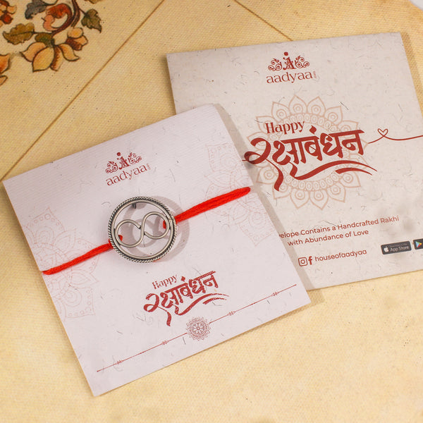 Handcrafted Silver Rakhi/Pendant: Infinity