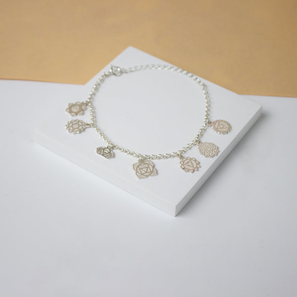 Silver Chakra Charm Bracelet on white background