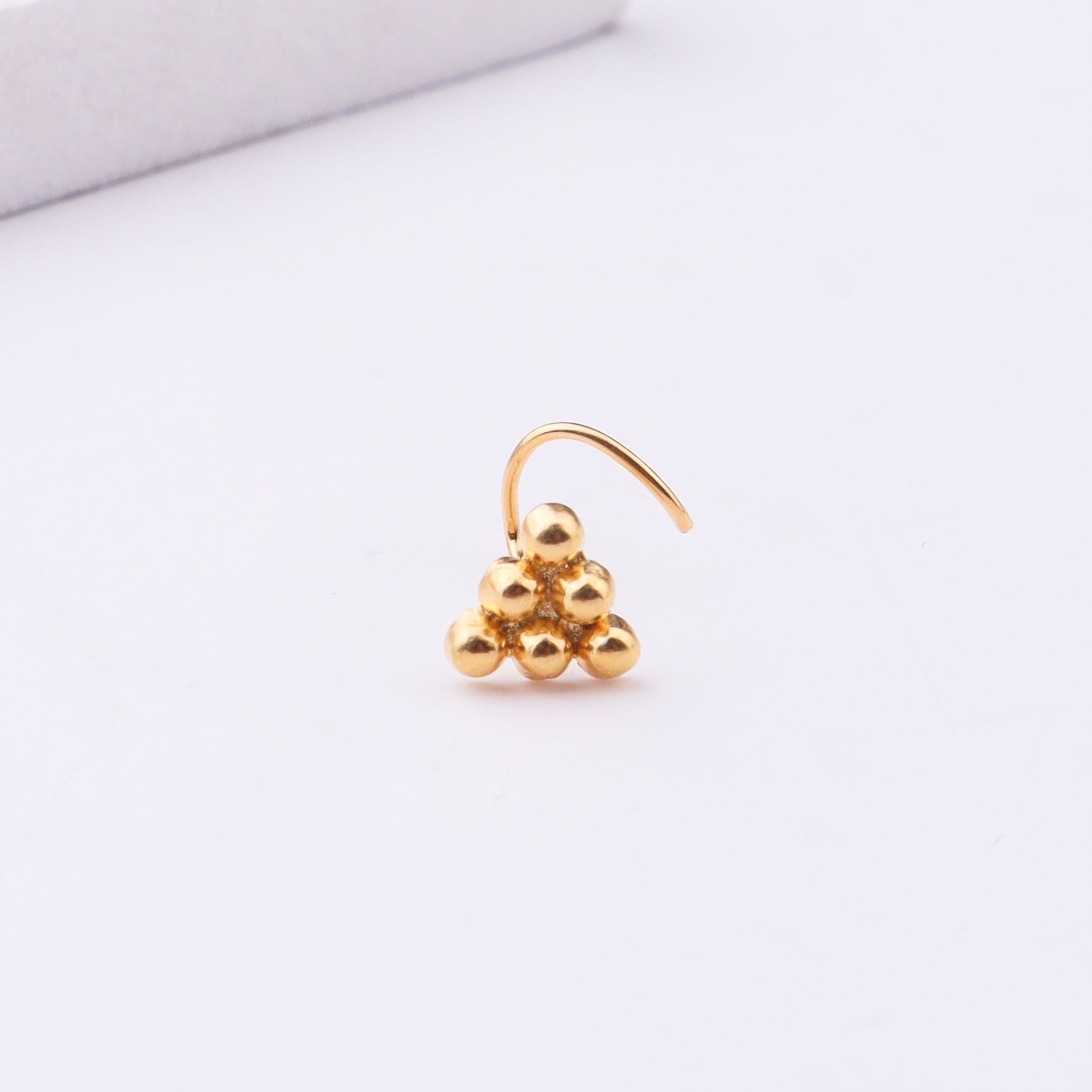 Gold pyramid nose pin jewelry