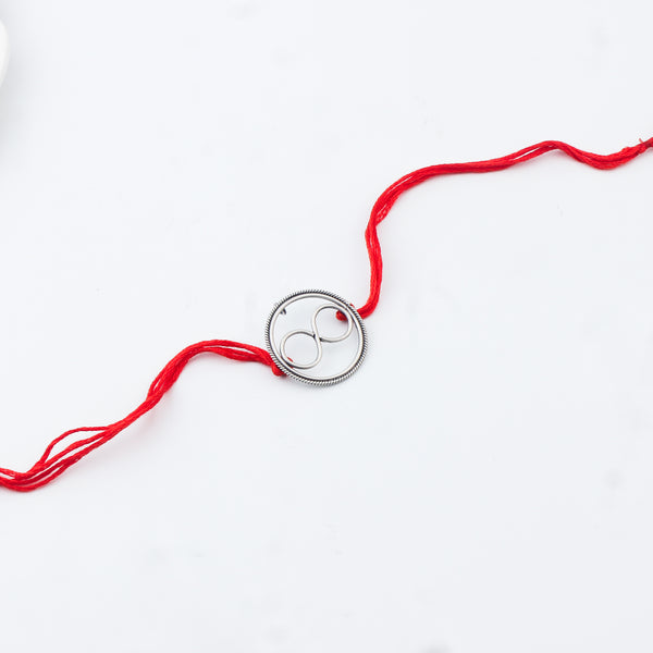 Handcrafted Silver Rakhi/Pendant: Infinity