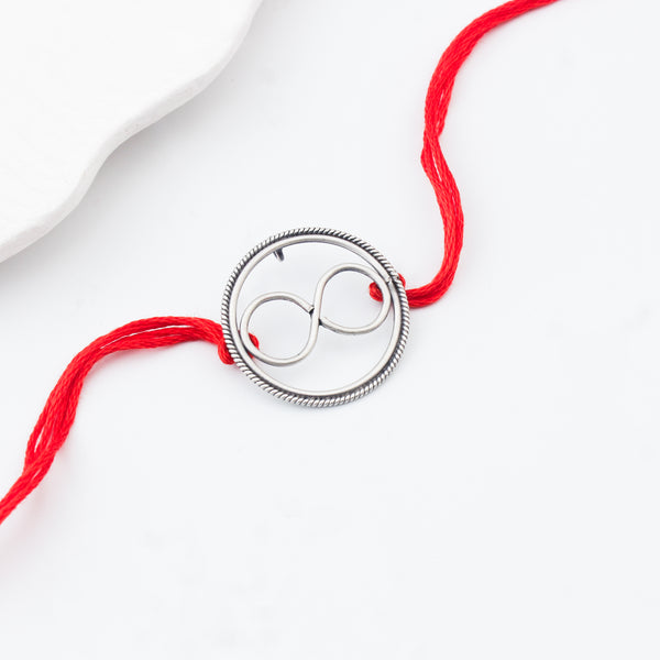 Handcrafted Silver Rakhi/Pendant: Infinity