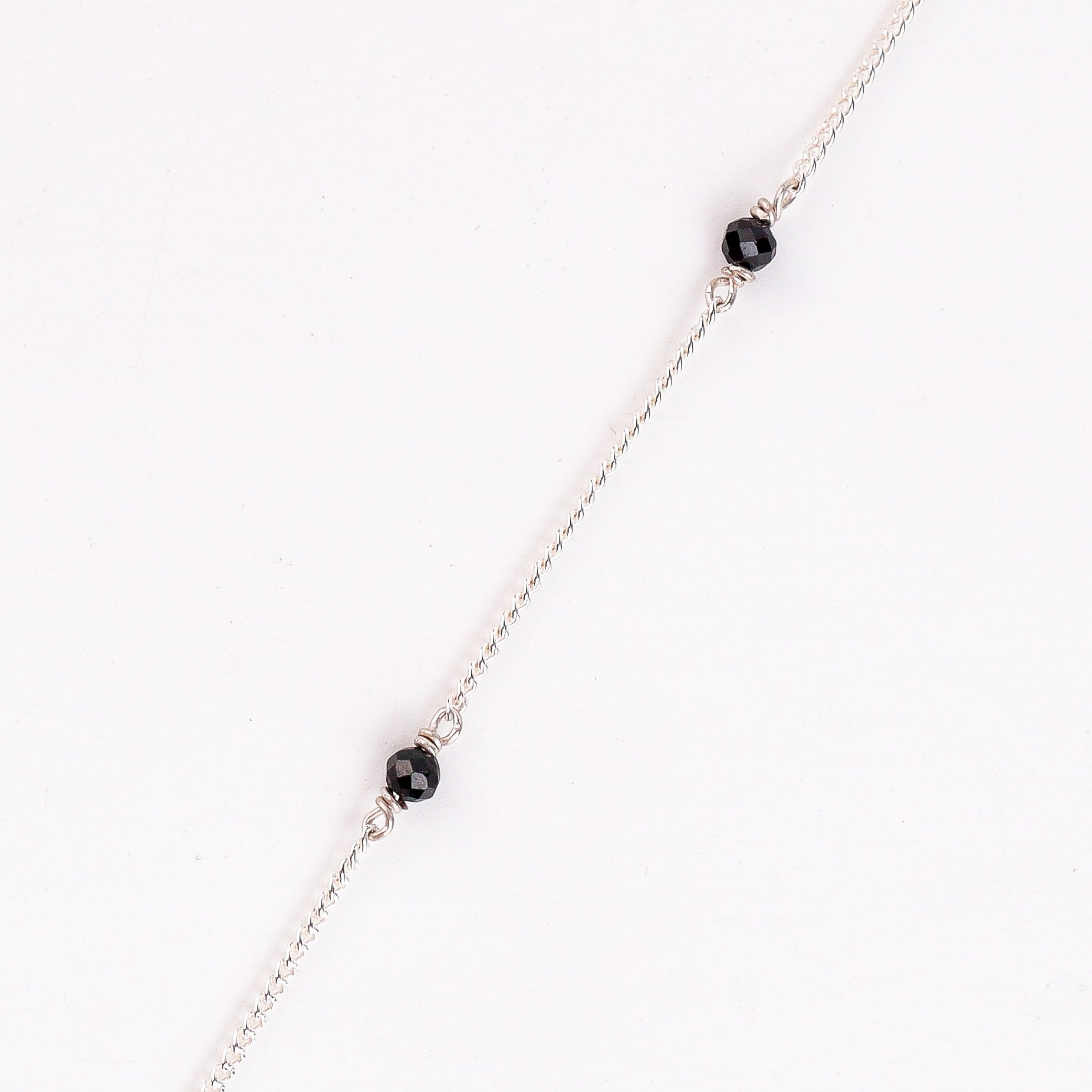 Petal necklace with Black Spinels