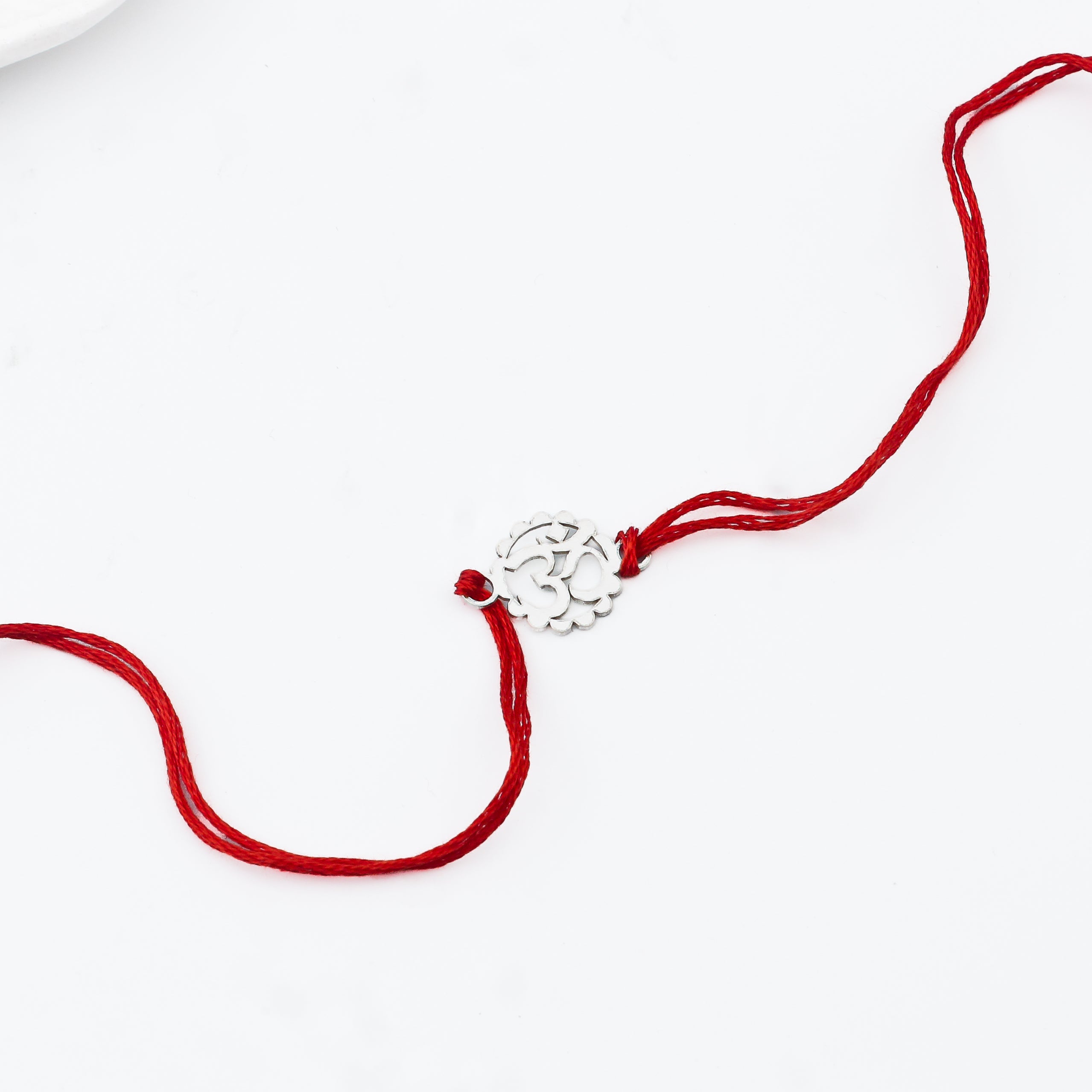 Silver Laser cut Om  Rakhi: Small