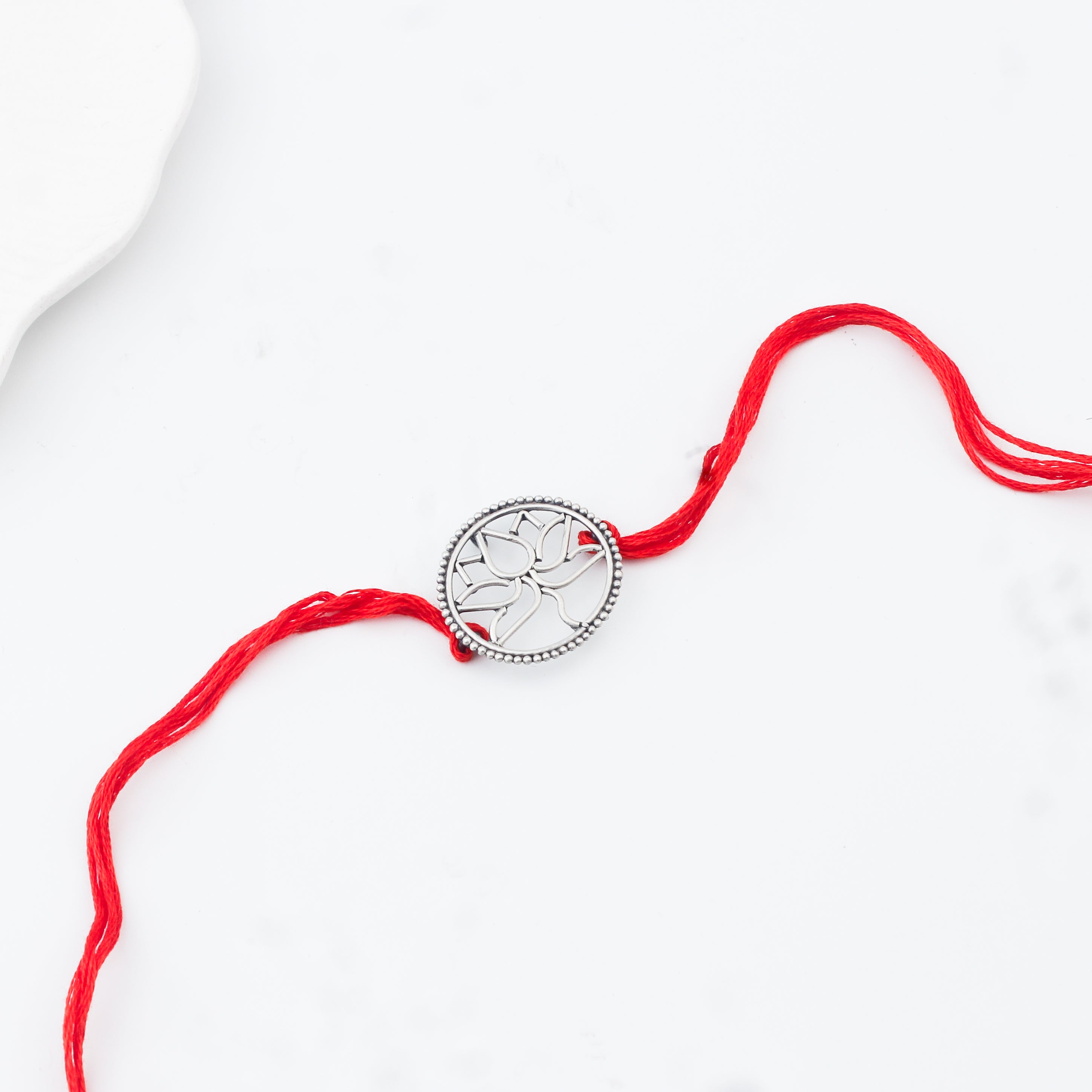 Handcrafted Silver Rakhi/Pendant: Lotus