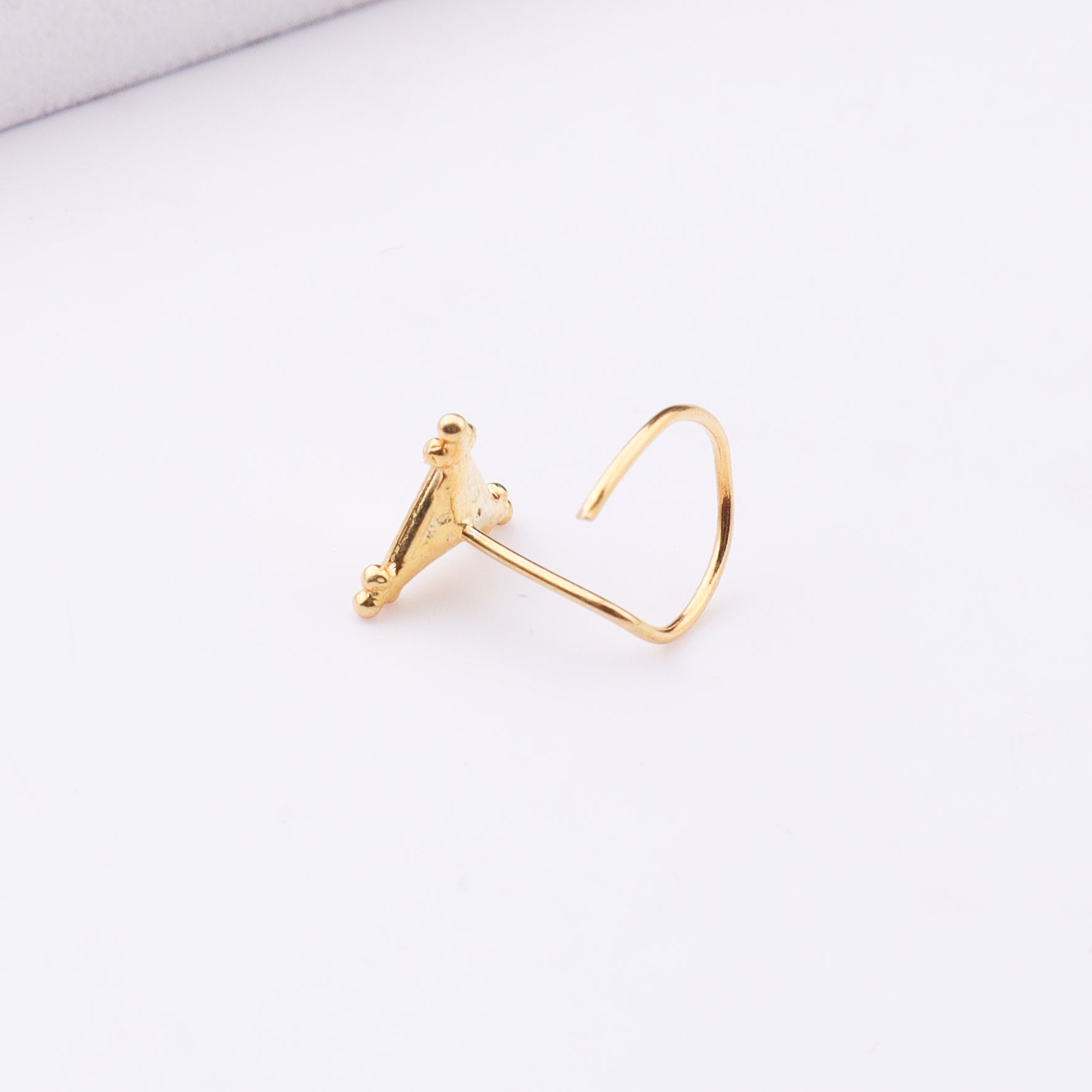 Gold plated nose pin with modern design for pierced noses