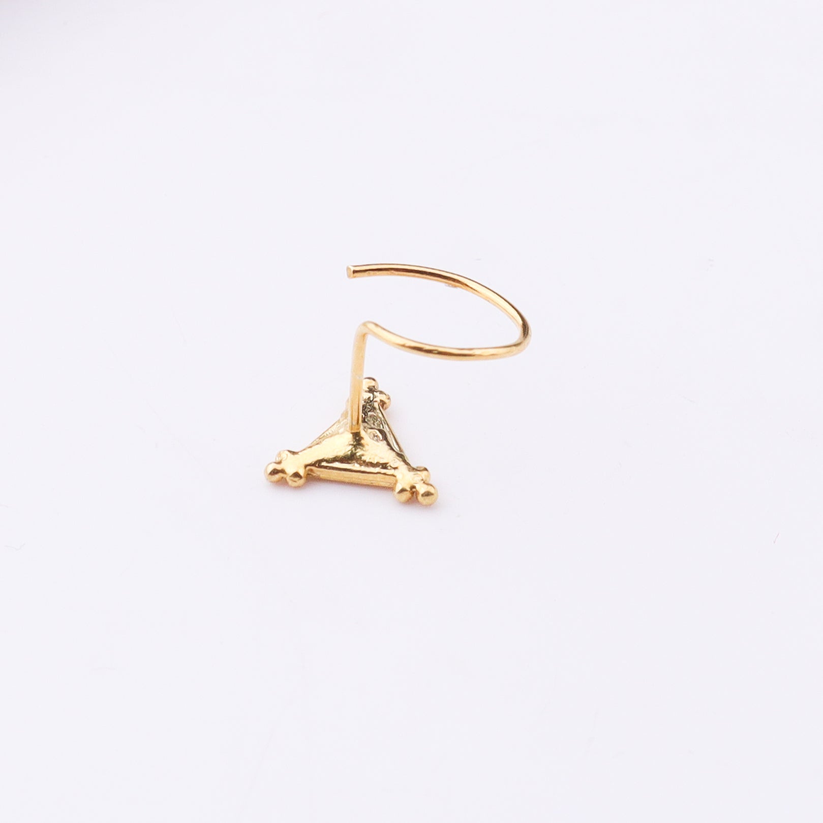 Gold nose pin with triangular design for pierced noses