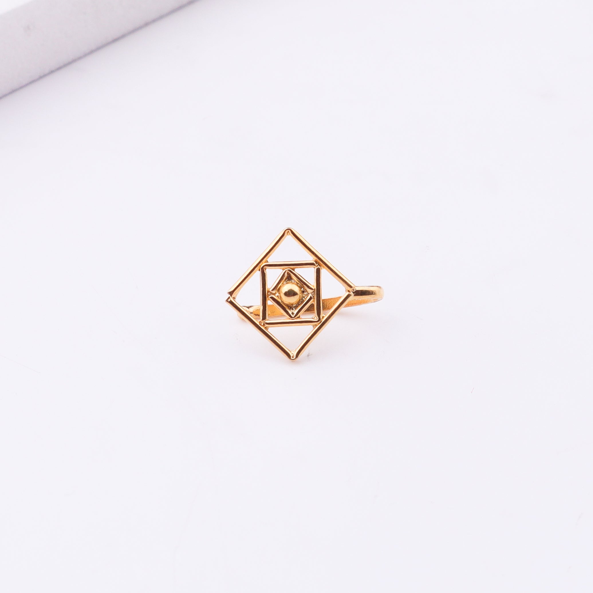 Gold plated geometric nose pin with star motif