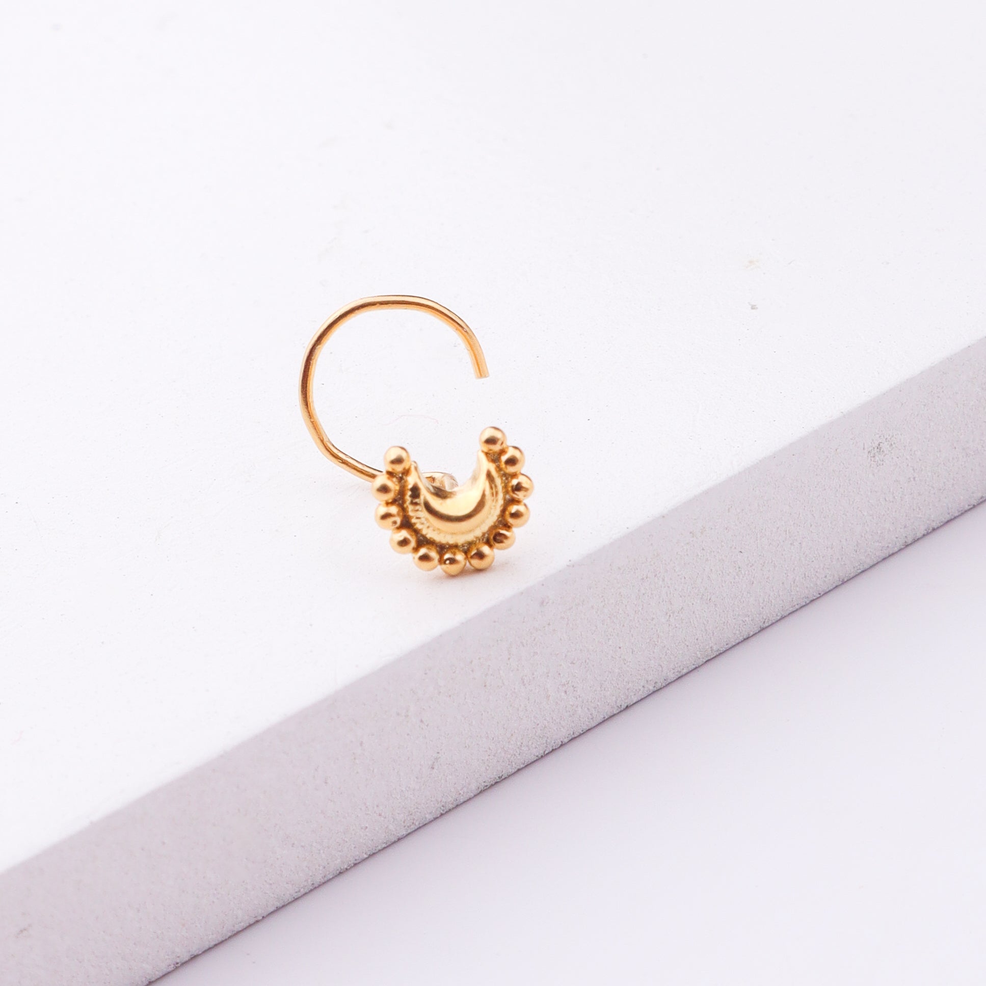 Gold plated crescent moon nose pin for pierced noses