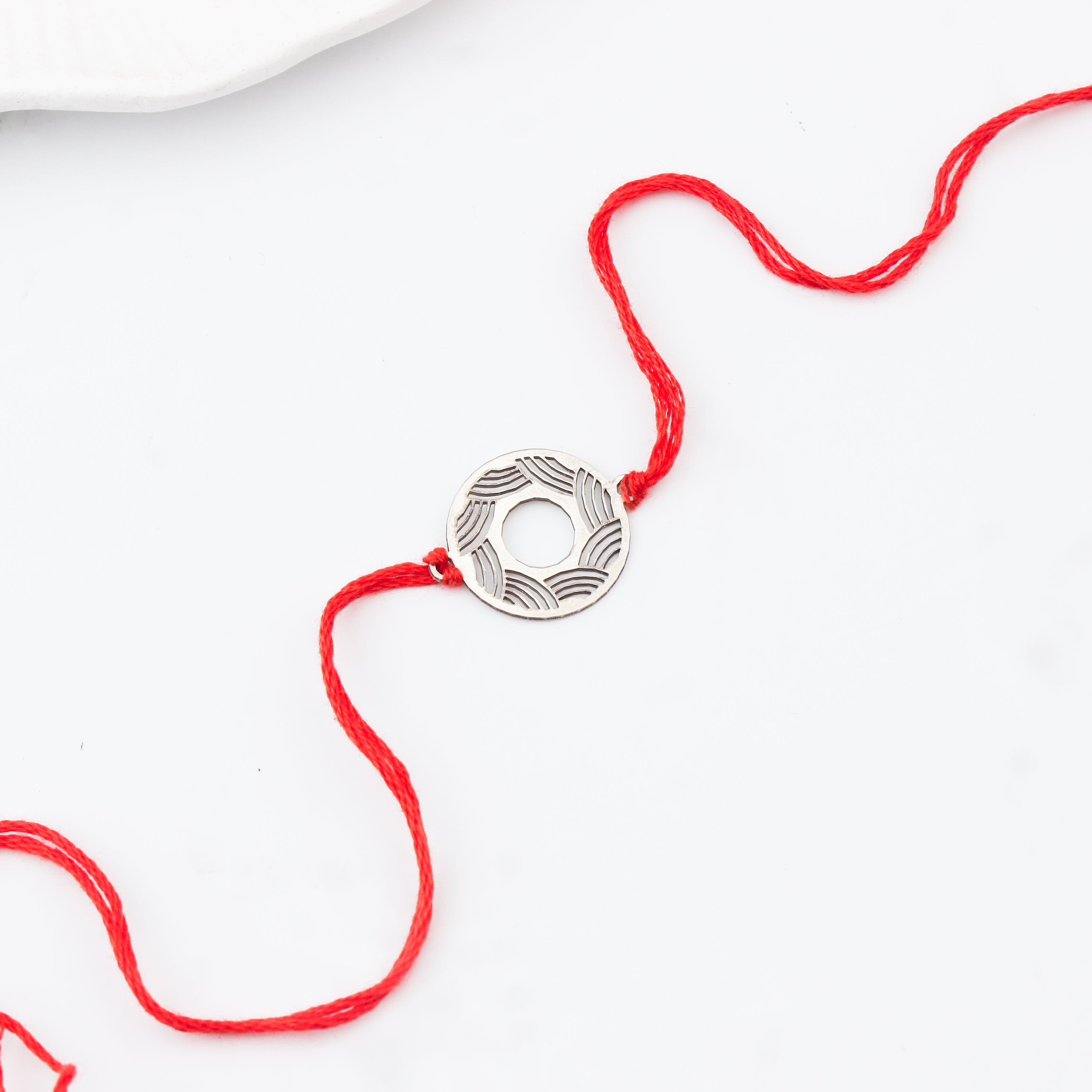 Silver Laser Cut Ripple Pattern Rakhi