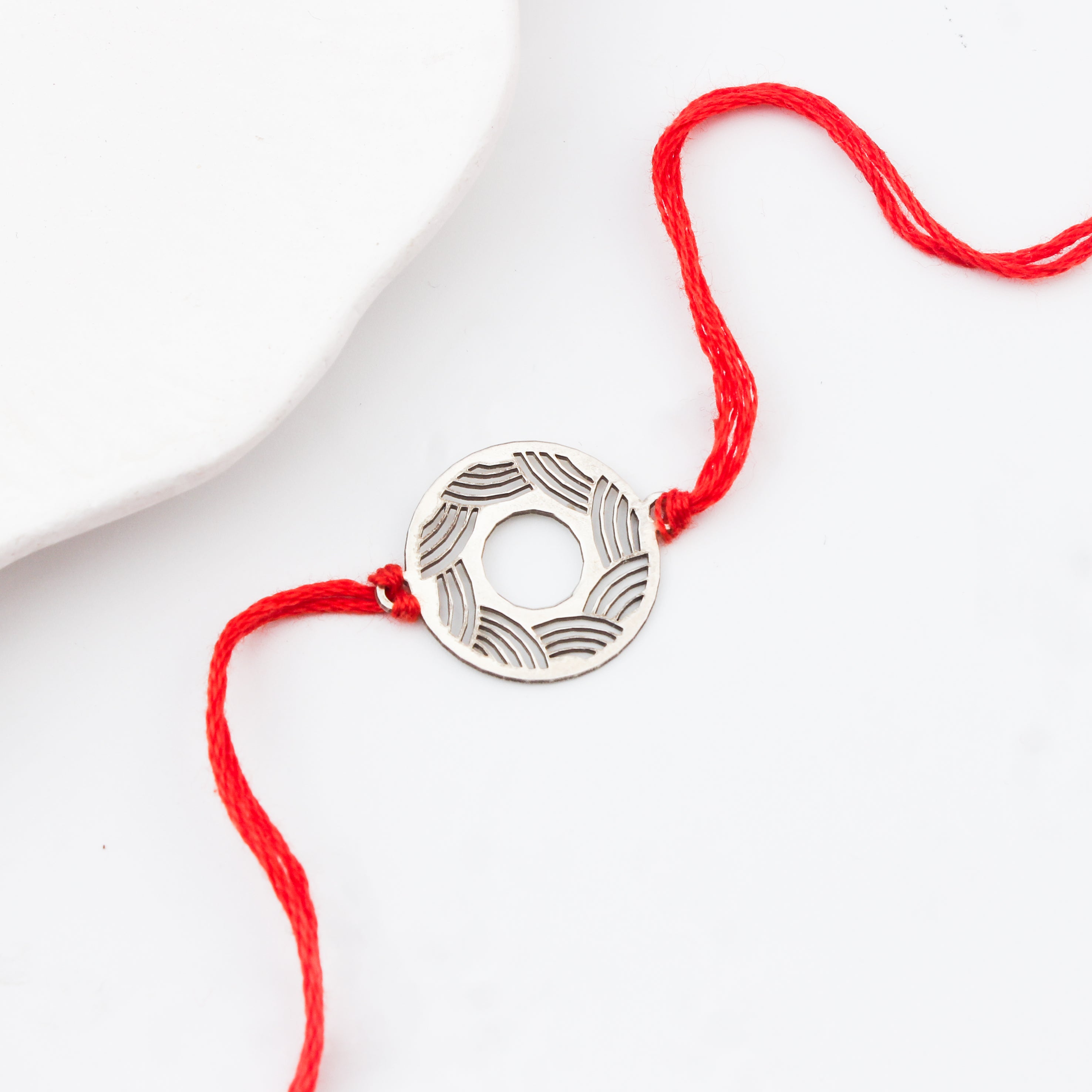 Silver Laser Cut Ripple Pattern Rakhi