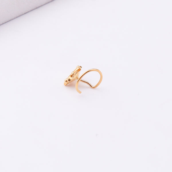Gold plated nose pin with floral design on white background