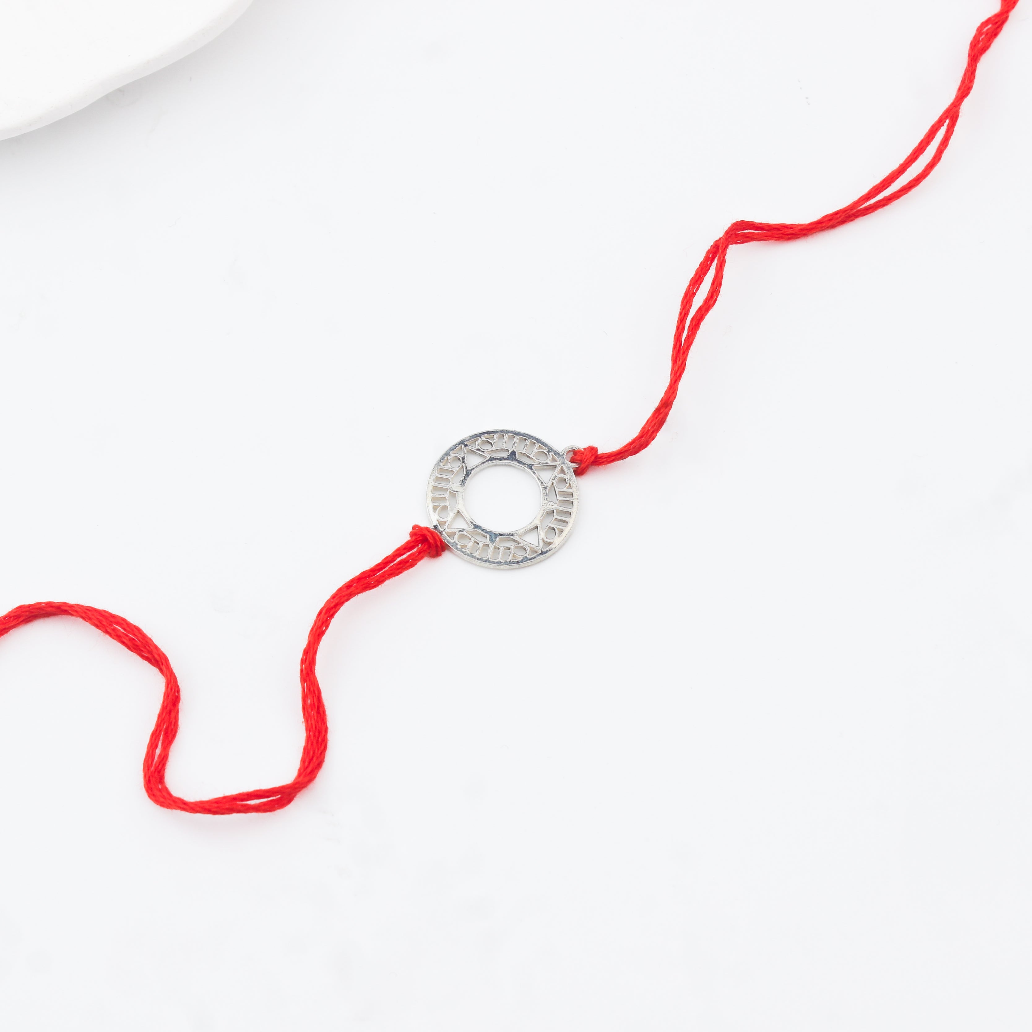Silver Laser Cut Filigree Rakhi