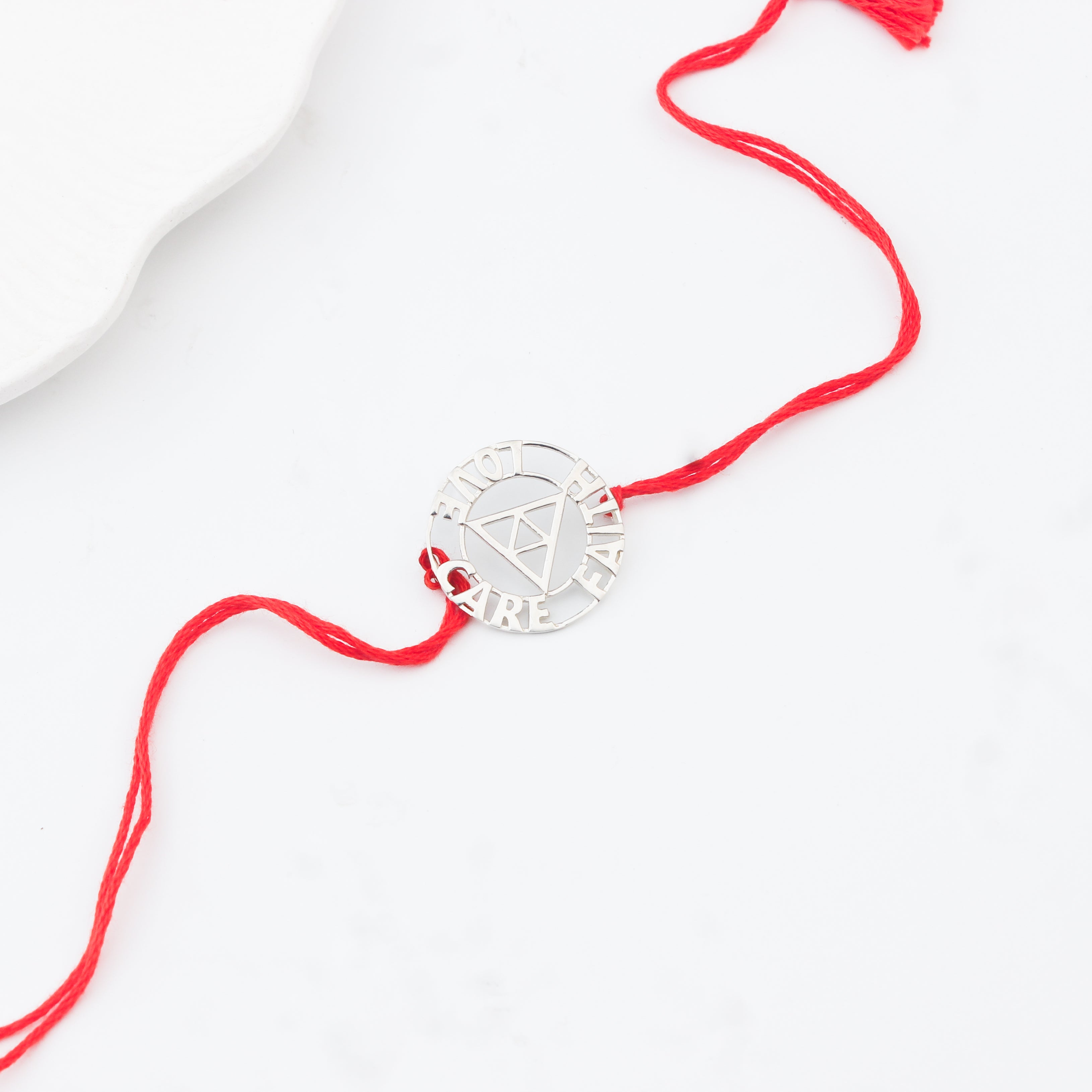 Handcrafted Silver Rakhi/Pendant: Love|Care|Faith