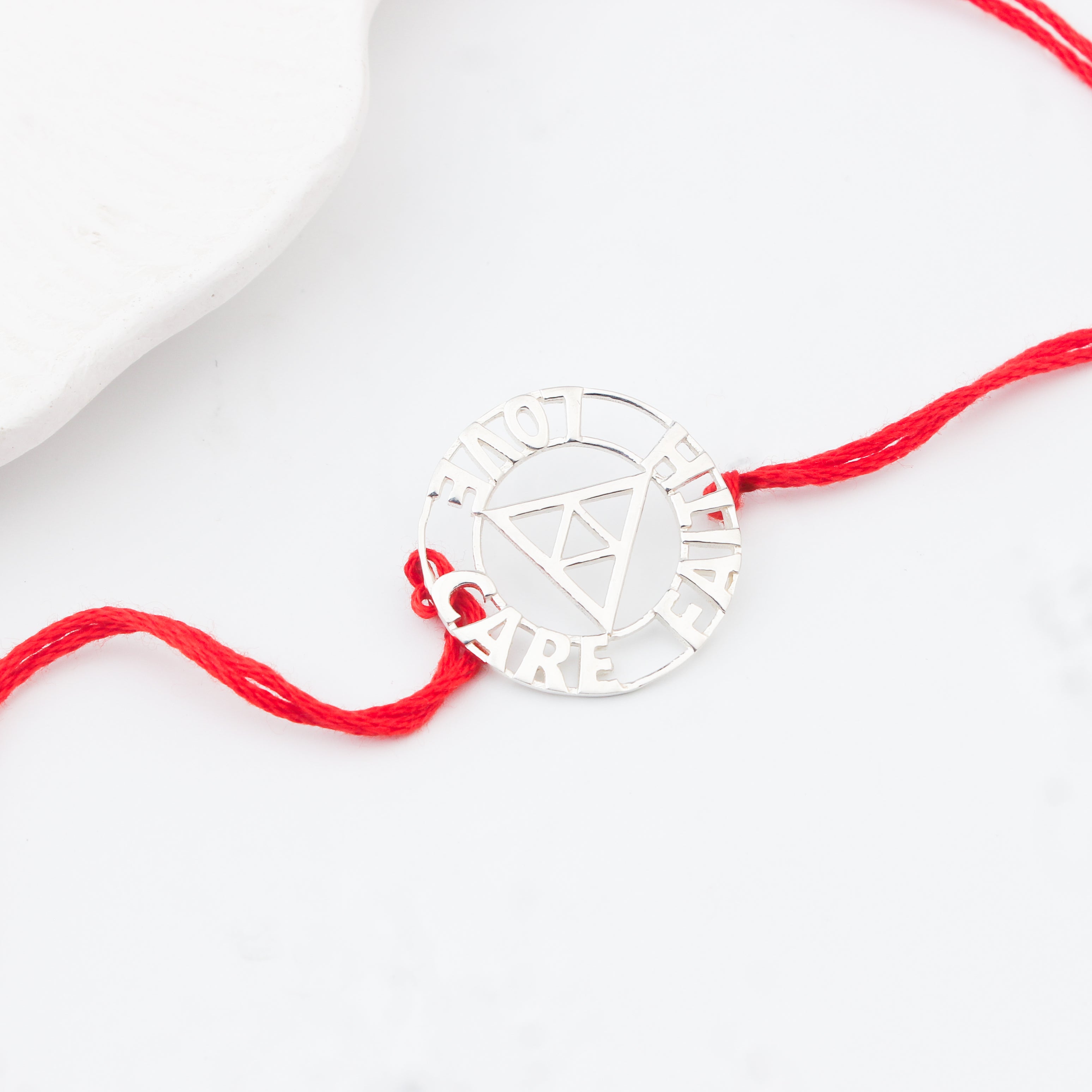 Handcrafted Silver Rakhi/Pendant: Love|Care|Faith