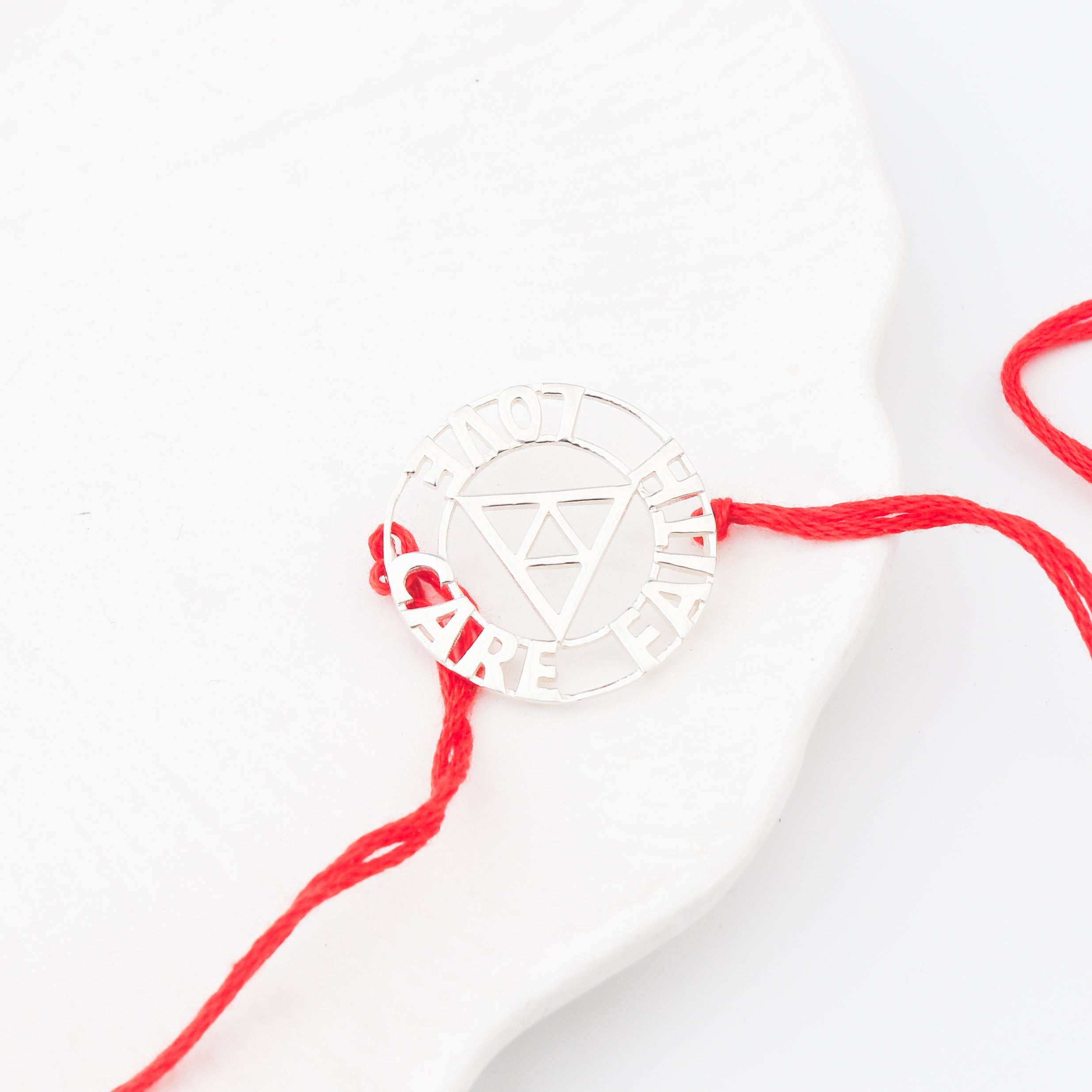 Handcrafted Silver Rakhi/Pendant: Love|Care|Faith