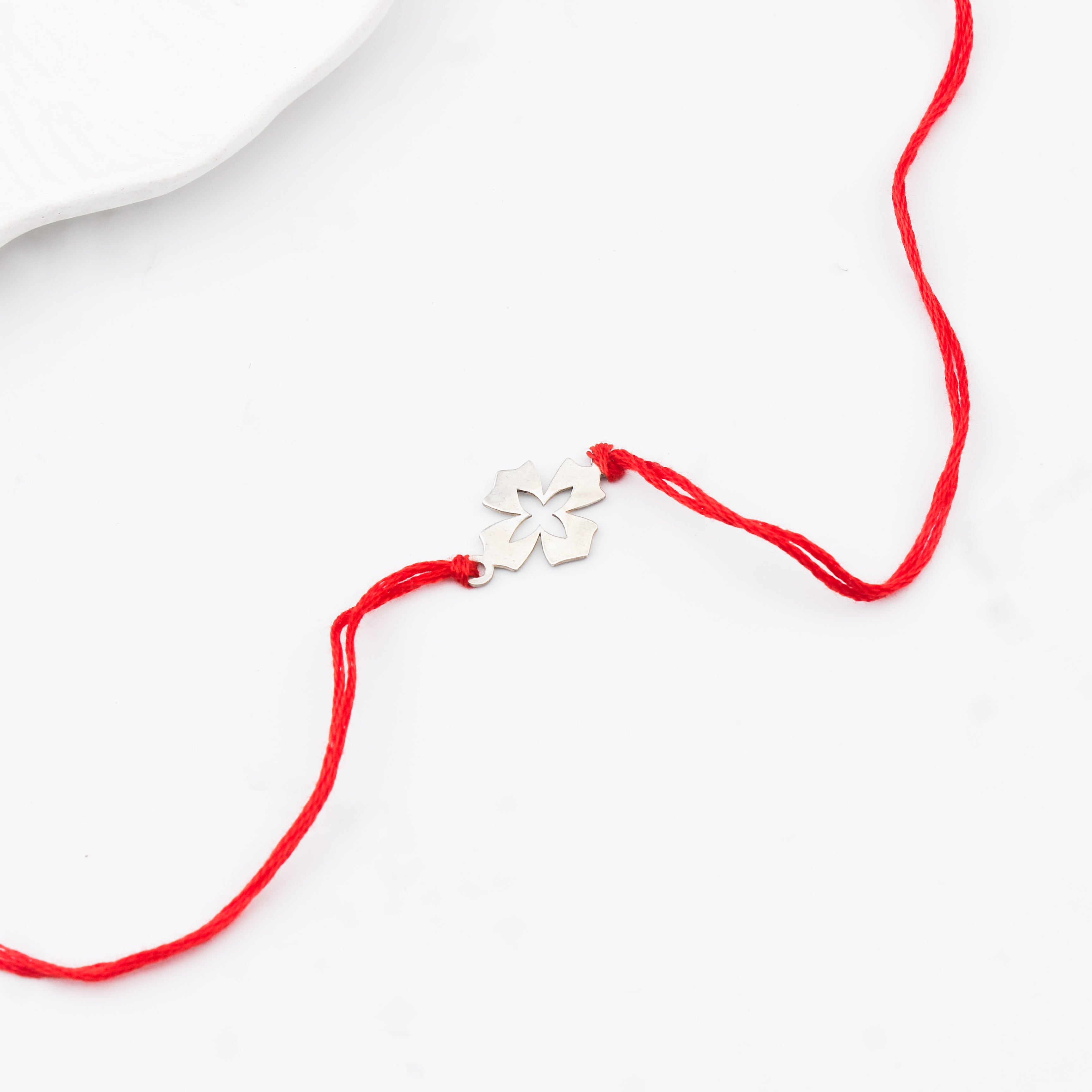 Silver Laser cut Flower Rakhi
