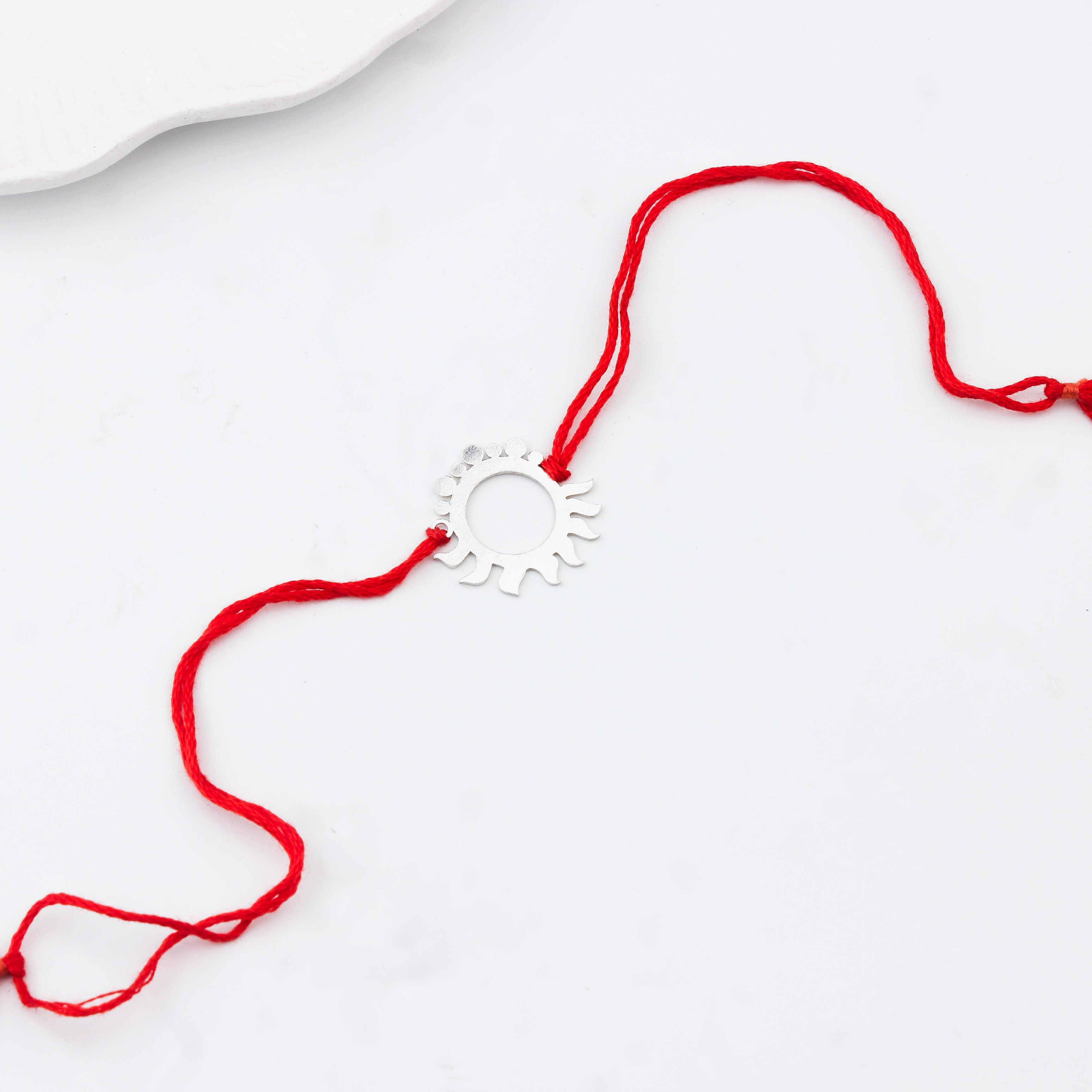 Handcrafted Silver Rakhi: Sun