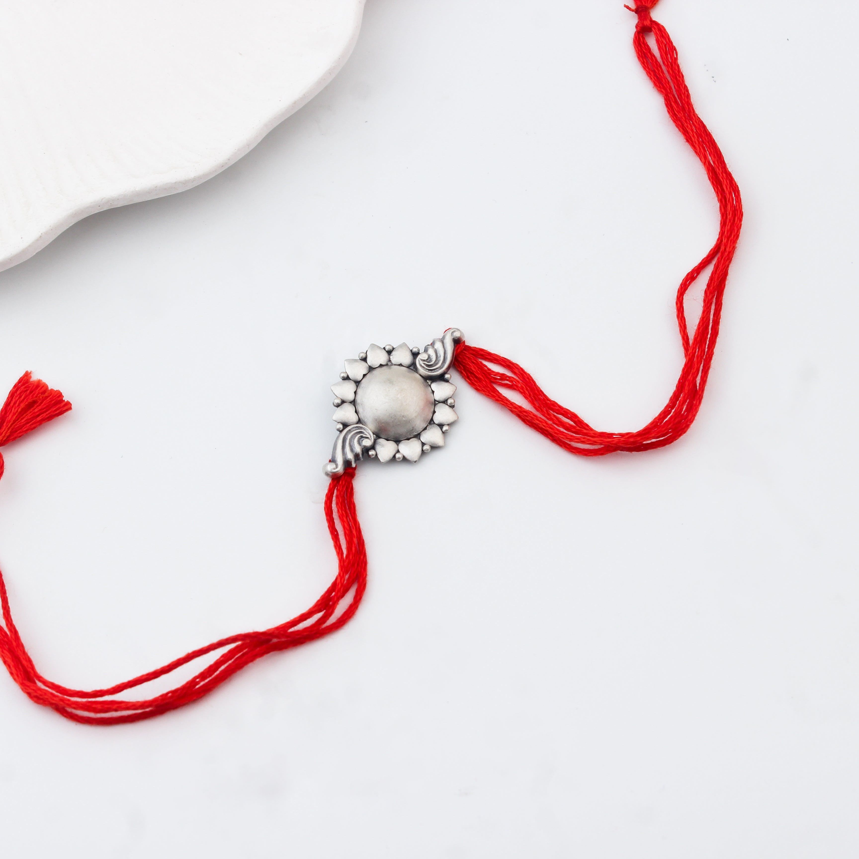Handcrafted Silver Rakhi/Pendant: Dome