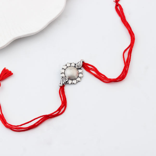 Handcrafted Silver Rakhi/Pendant: Dome