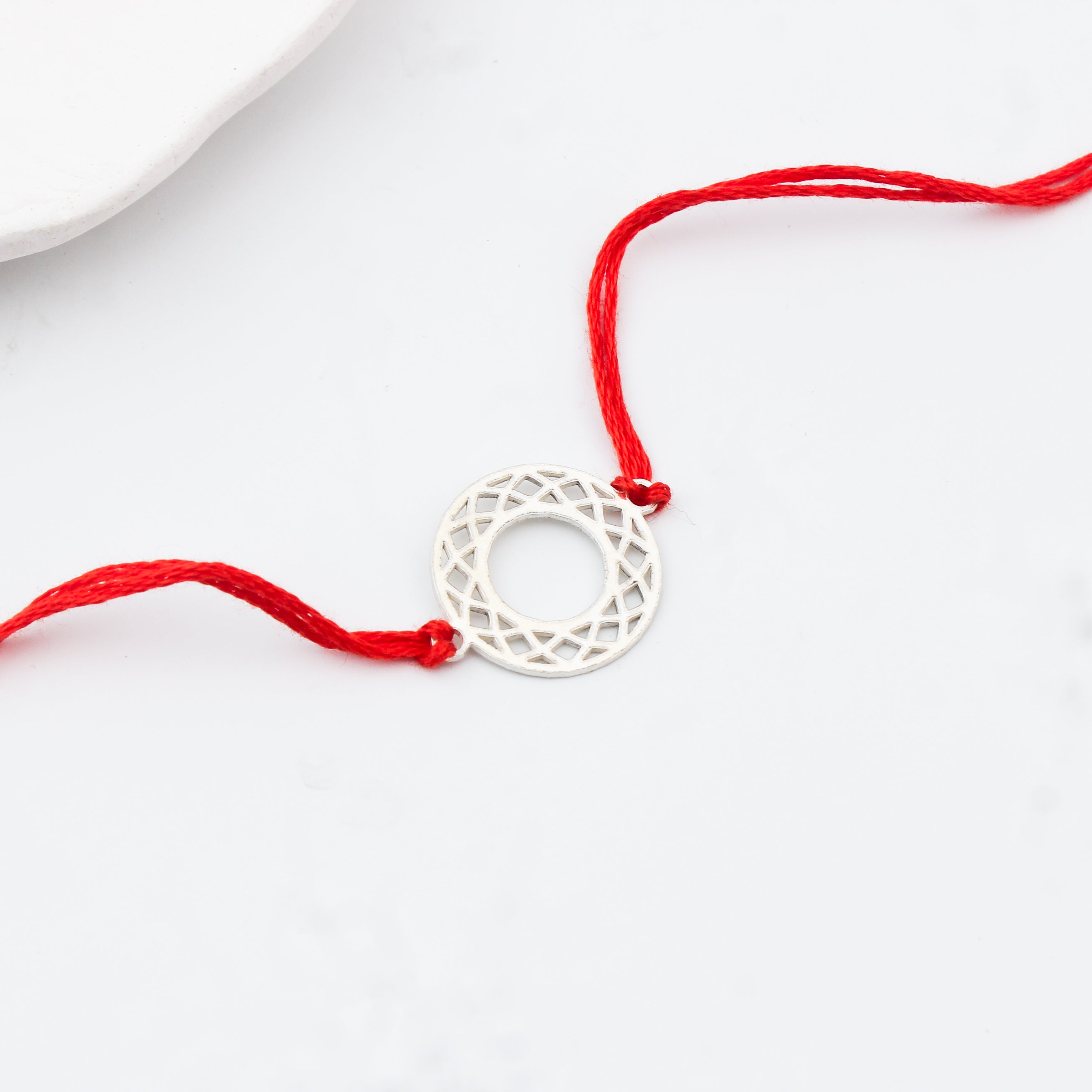 Silver Laser Cut Filigree Round Rakhi