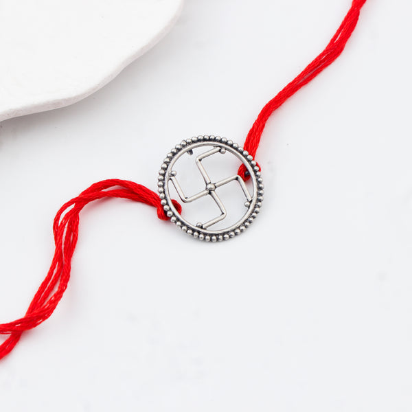 Handcrafted Silver Rakhi/Pendant: Swastik