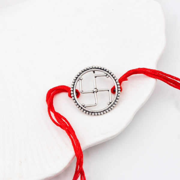 Handcrafted Silver Rakhi/Pendant: Swastik
