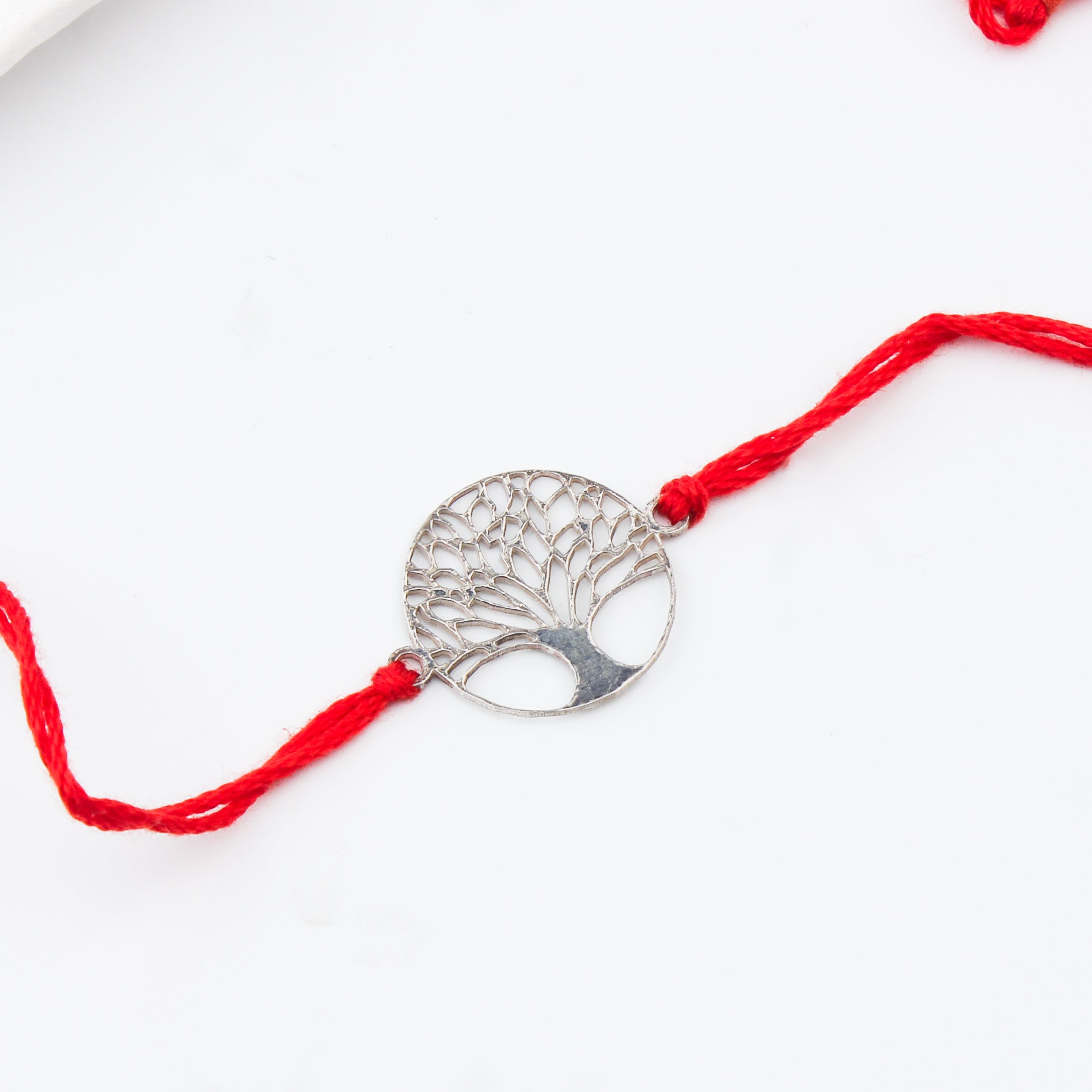 Silver Laser Cut Kalpavriksha Rakhi