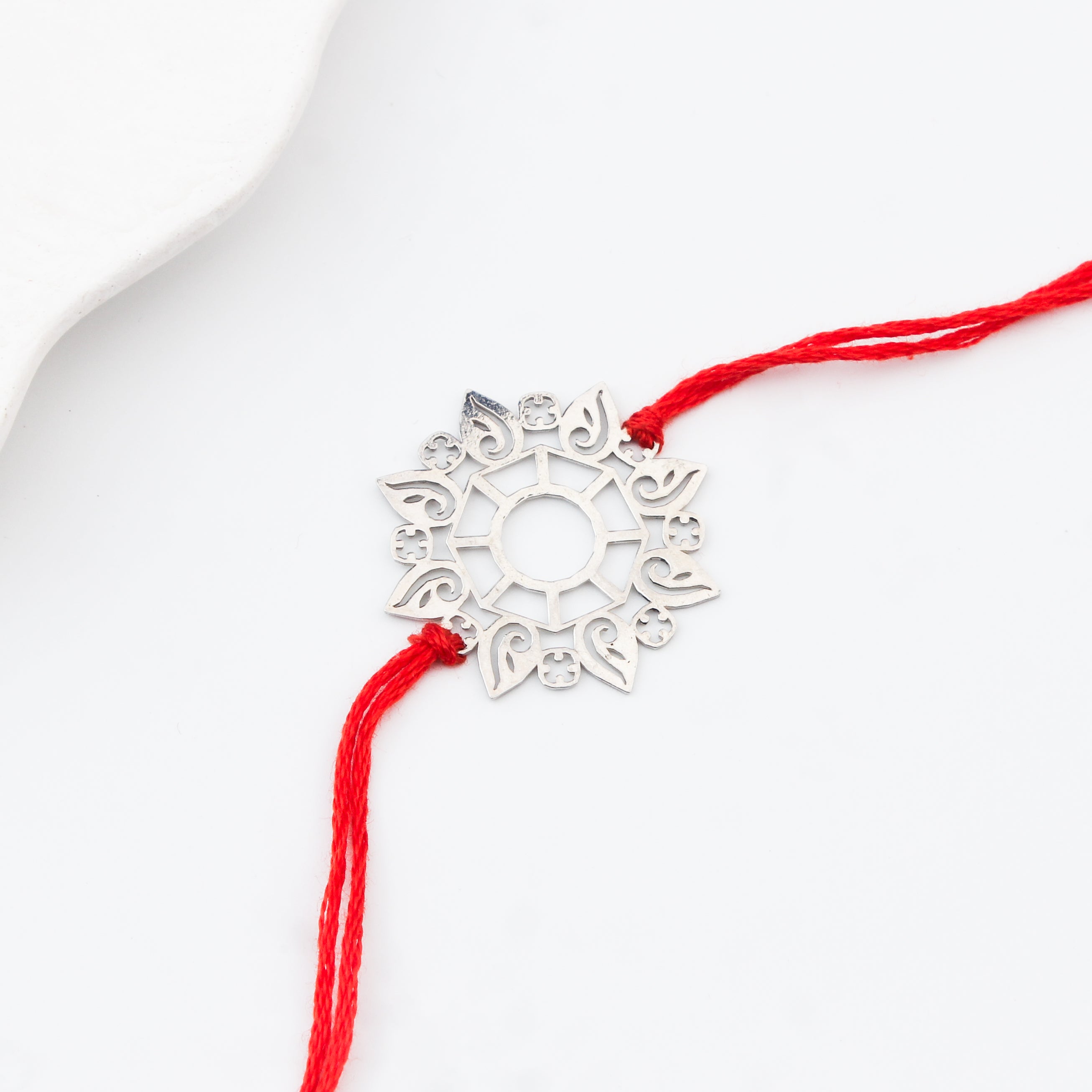 Silver Laser Cut Abstract Rakhi