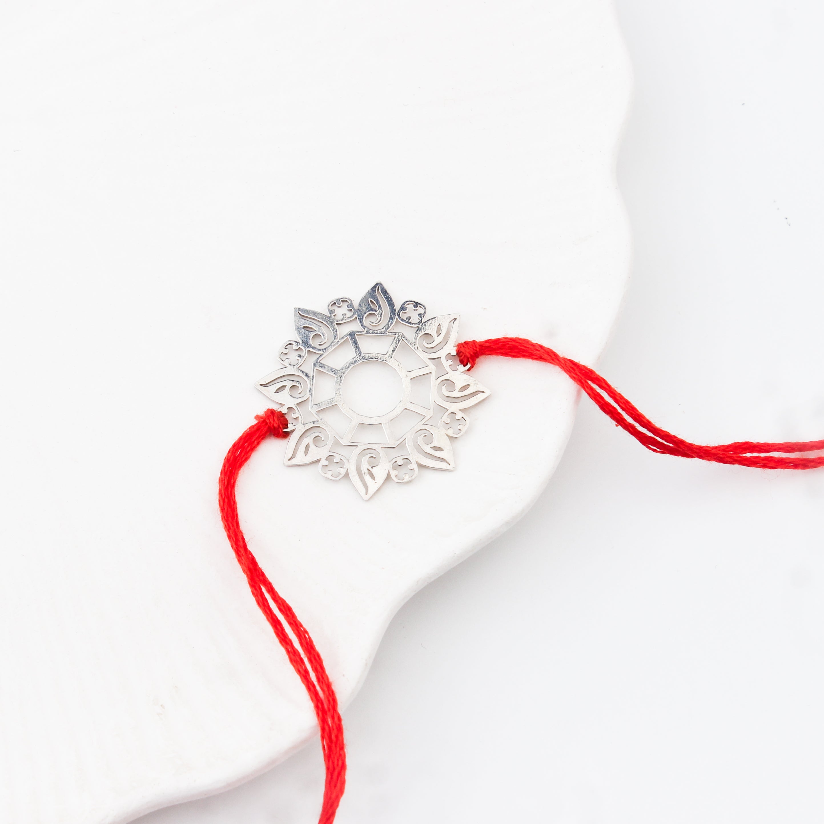 Silver Laser Cut Abstract Rakhi