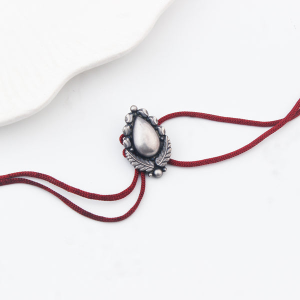 Handcrafted Silver Rakhi/Pendant: Drop