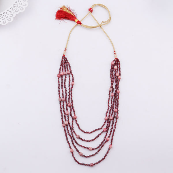 Red and pink beaded layered necklace with tassel detail