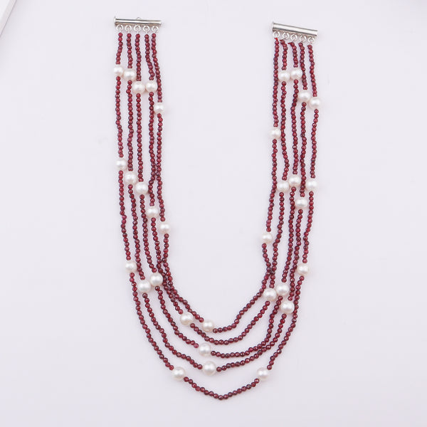 Multi-layer red beaded necklace with white pearls