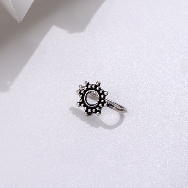 Silver ring with circular beaded design for jewelry