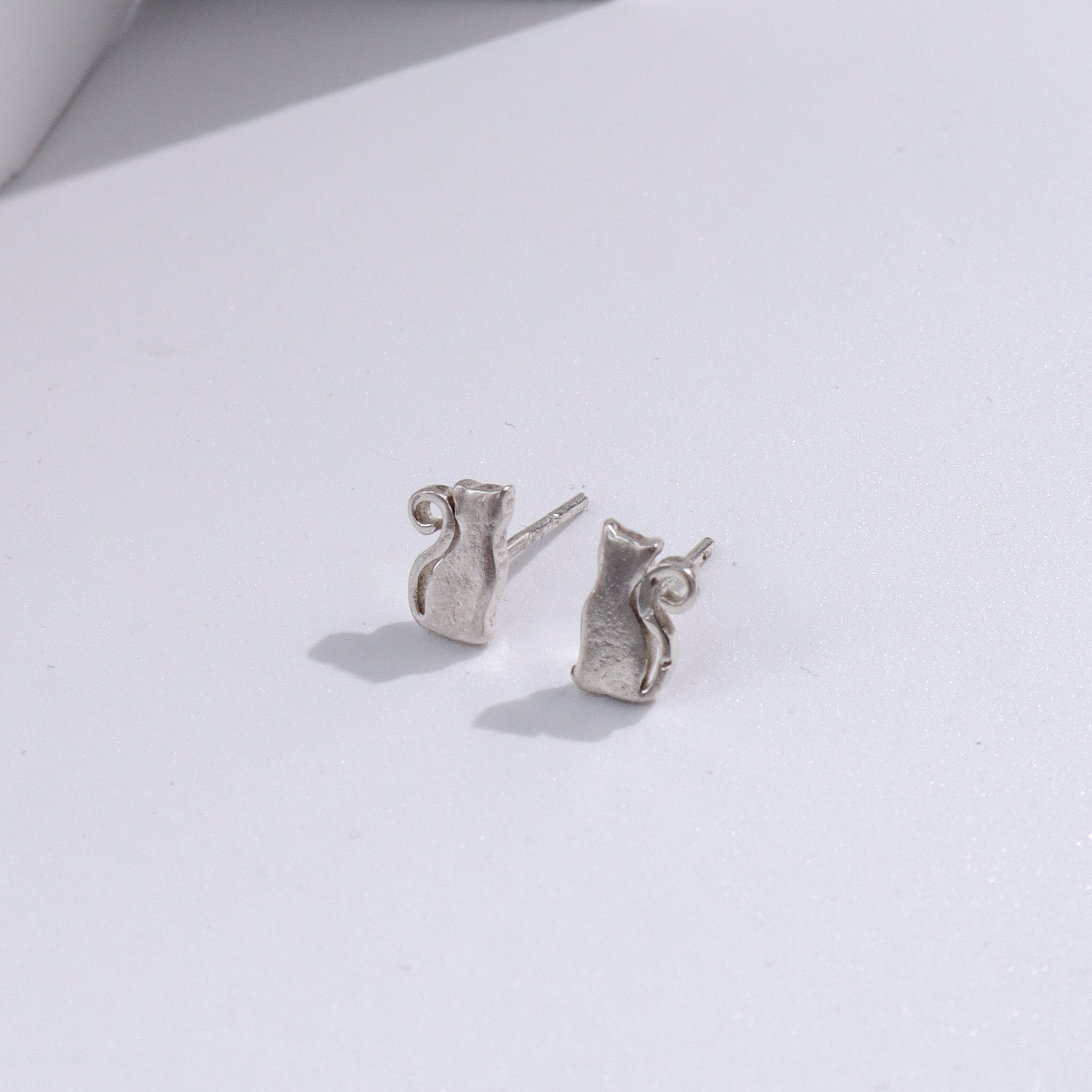 Silver cat stud earrings for jewelry lovers