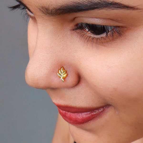 Gold leaf nose pin on pierced nose