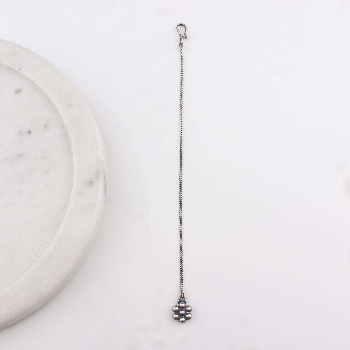 Silver Kudi Motif Maang Tika